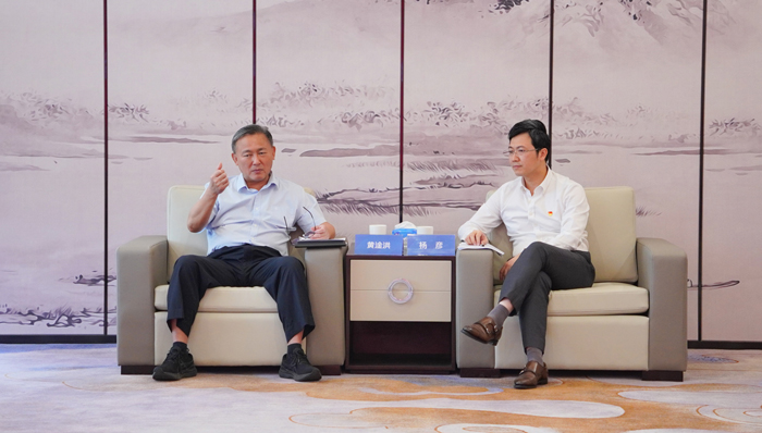 樟木头镇党委书记黄淦洪一行莅临彩运网调研指导